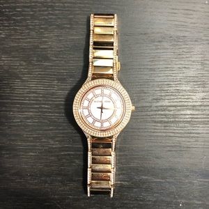Rose gold and diamond watch